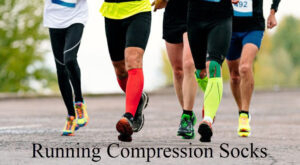 Image of male runners legs with different colored compression socks