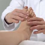 orthopaedic specialists examining foot