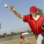 image of baseball player with Elbow Injuries In Youth Athletes include little league elbow
