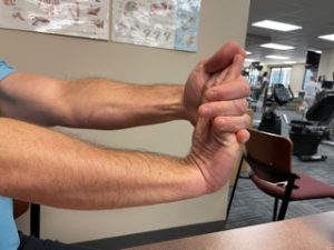 Wrist Flexor Stretch helps with pain from golfers elbow
