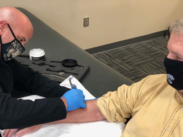 The Graston method helps reduce elbow pain caused by tendonitis in addition to elbow brace for tendonitis